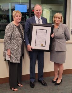 President Guerin and GM Thorner honor Larry Watt with resolution at board meeting